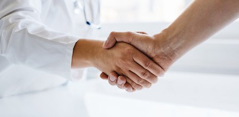 Doctor accepting patient